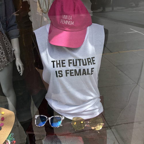 Picture of a mannequin in a shop-window wearing a t-shirt that says 'The future is female'
